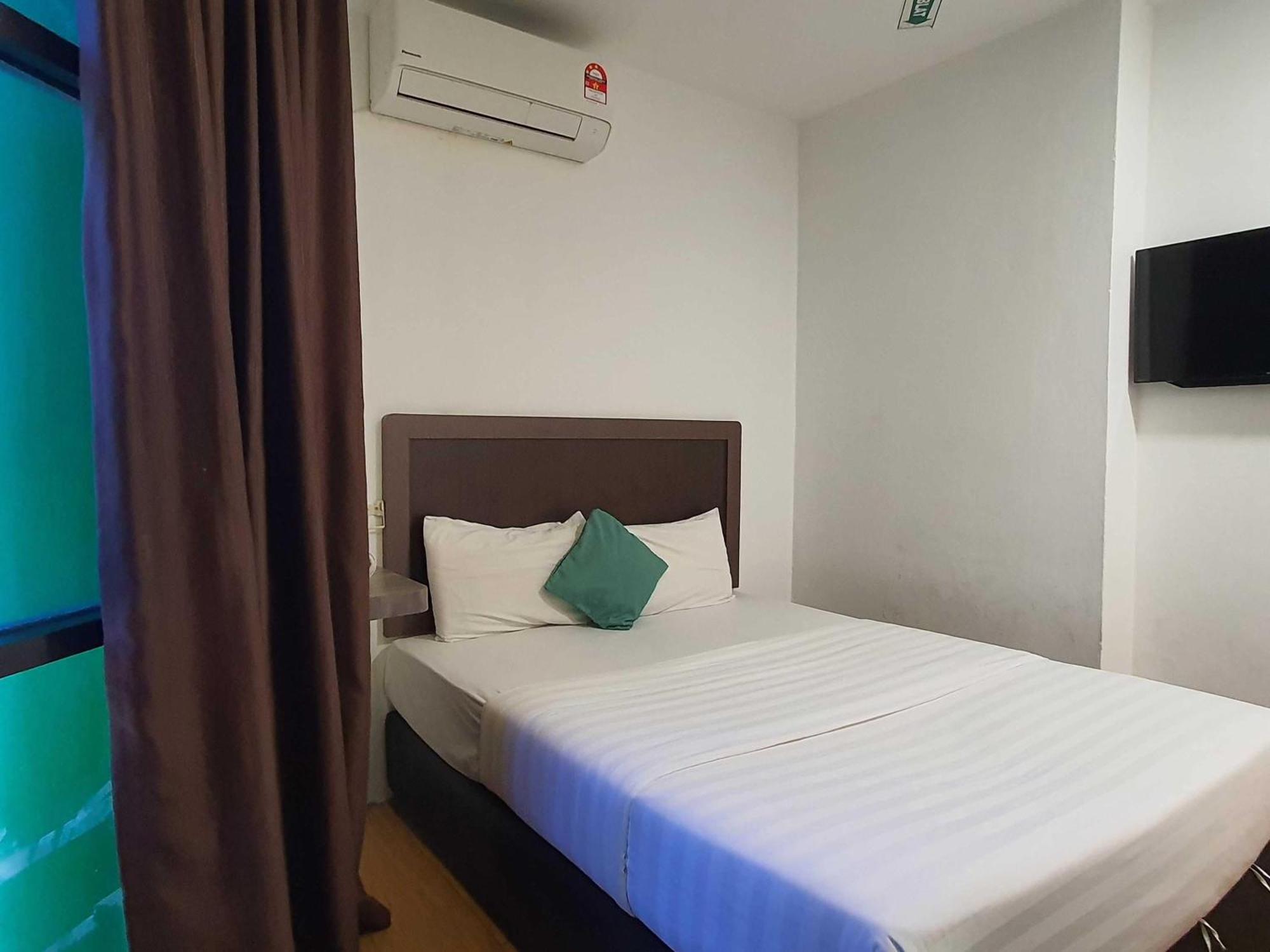 Oyo 91053 Signature Inn Miri Exterior foto
